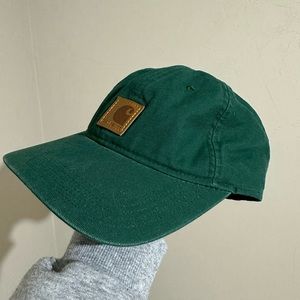 Carhartt hat, dark green dad vibe style